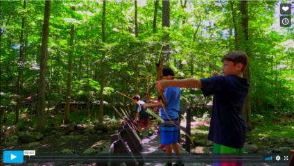 campers shooting archery